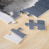 Weißes Westhochland Terrier, das auf Bürgersteig Puzzle (Seite)