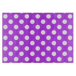 Weißpolka Punkte auf leuchtend lila Schneidebrett