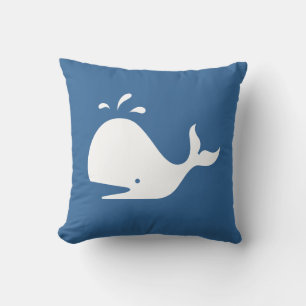 Weißwal aus CARTOON auf mittelblauem Kissen