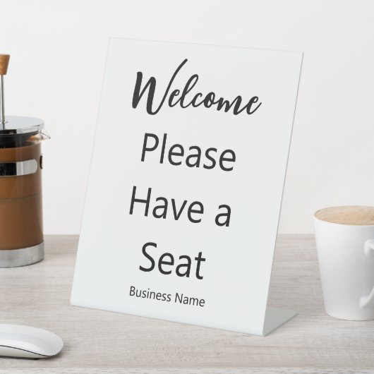 Welcome Please Have a Seat Business Name White Sockelschild (In SItu)