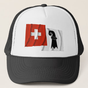 Wellenartig bewegende Flaggen der Schweiz u. Truckerkappe