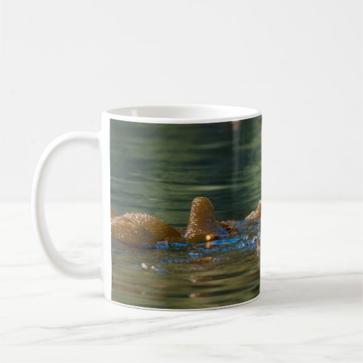 Wellenseeotter Kaffeetasse (Links)