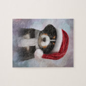 Welpe Bernese Gebirgshund im roten Hut von Sankt Puzzle (Horizontal)