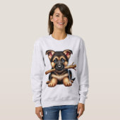 Welpe der deutschen Hirten, die sich einen Keil in Sweatshirt (Vorne ganz)