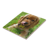 Welpe, der Lippen leckt Fliese (Seite)