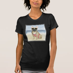 Welpe des Würstchen- in der Sonnenbrille am T-Shirt
