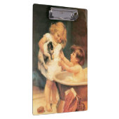 Welpe, die ein Bad Vintag antike Klemmbrett (Rechts)