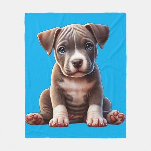 Welpe mit blauen Augen sitzend und unschuldig auss Fleecedecke (Vorderseite)