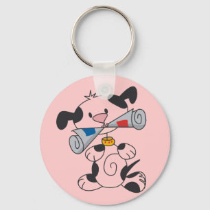 Welpe mit Zeitungs-T-Shirts und Geschenken Schlüsselanhänger