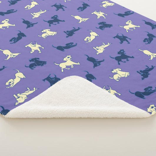 Welpen aus Gelb und Schwarz im Lila Hintergrund Sherpadecke (3/4)