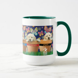 Welpen in der Flowerpots-Tasse Tasse