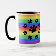 Welpenpaare auf einer Rainbow-Background-TASSE