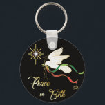 Weltfrieden der weißen Taube Schlüsselanhänger<br><div class="desc">Schöne Schlüsselkette "Eine Art"! Es hat eine serene Weiße Taube fliegen und tragen einen Olivenzweig mit blühenden Red & Green Ribbons Spreading ... Weltfrieden! Dies ist ein Original Art Design von Künstler Kerry Miller.</div>
