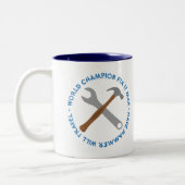 Weltmeister-Verlegenheit es Mann-Geschenk Zweifarbige Tasse (Links)