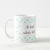 Wenigstens ist niemand gestorben, lustiger Schlamm Kaffeetasse (Links)