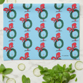 Wer durch den Weihnachtskranz schaut Geschirrtuch (Gefaltet)