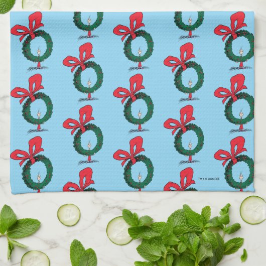 Wer durch den Weihnachtskranz schaut Geschirrtuch (Gefaltet)