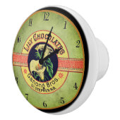 Werbung für Jugendstiluhr-Schokoladenfirma Keramikknauf (Rechts)