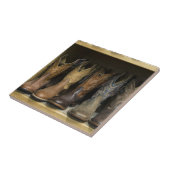 Western Cowboy Stiefel auf dem Regal Fliese (Seite)