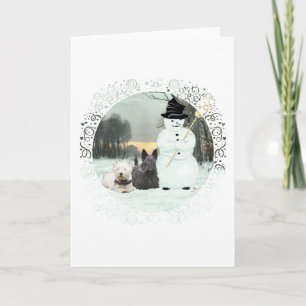 Westie und Scottie bauen einen Schneemann Feiertagskarte