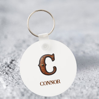 Westlicher geprägter Lederinitial-Monogramm-Schlüs Schlüsselanhänger