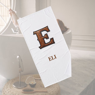 Westliches, geprägtes Lederinitial-Monogramm E Badehandtuch