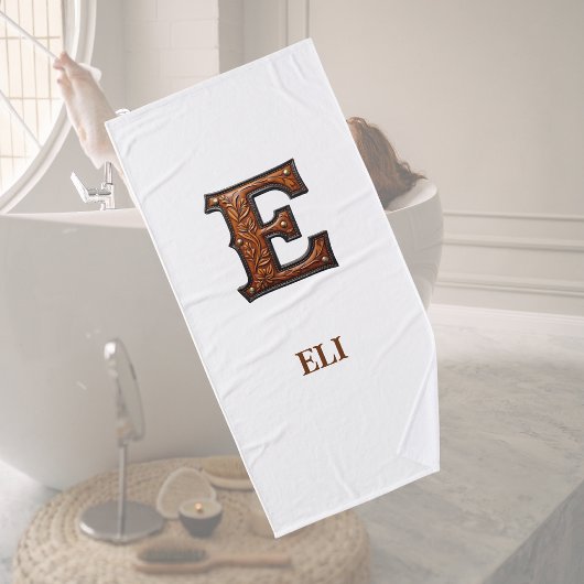 Westliches, geprägtes Lederinitial-Monogramm E Badehandtuch