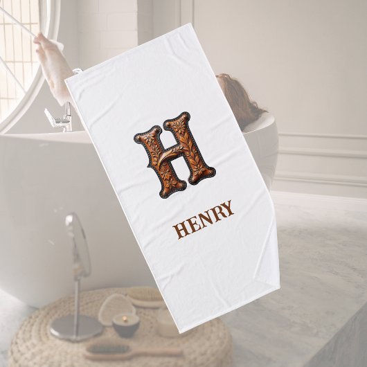 Westliches geprägtes Lederinitial-Monogramm H Badehandtuch