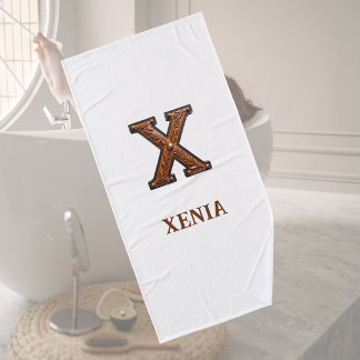 Westliches geprägtes Lederinitial-Monogramm X Badehandtuch