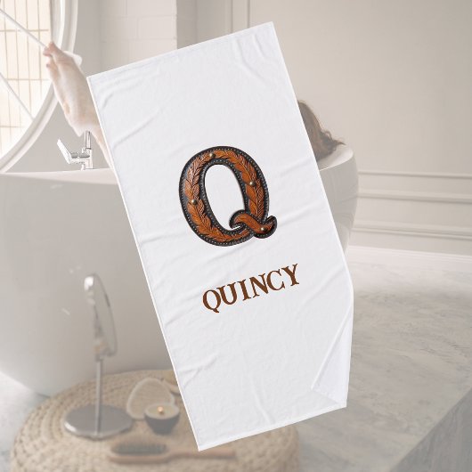 Westliches Werkzeugleder Initial Monogramm Q Badehandtuch