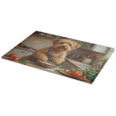Wheaten Terrier Cooking in Kitchen Schneidebrett (Ecke)
