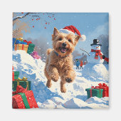 Wheaten Terrier läuft im Schnee mit Weihnachtshut Magnet (Vorne)