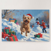 Wheaten Terrier läuft im Schnee mit Weihnachtshut Puzzle (Horizontal)