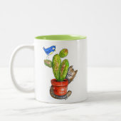 Whimsical Sneaky Cat with Cactus Zweifarbige Tasse (Links)