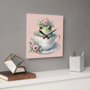 Whimsicaler Frosch in floraler Teetasse Quadratische Wanduhr