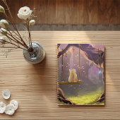 Whimsikkatze auf einem Schaukelplaner Planer