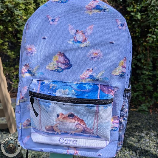Whimsischer Aquarellfrosch auf einem schwingenden  Bedruckter Rucksack