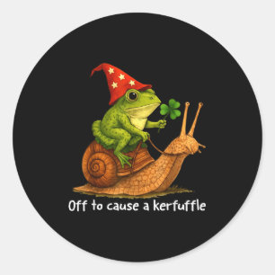 Whimsischer Froschzauberer, der einen Wirbel verur Runder Aufkleber