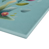 Whimsisches Patchwork Schweinefleisch im Blumengar Schneidebrett (Ecke)