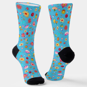 Whimsistische Blume im blauen Hintergrund Socken