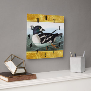 White and Black mallard ducks swimming in water Quadratische Wanduhr