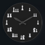 White Chess Pieces Clock Große Wanduhr<br><div class="desc">Wall Clock with the white chess pieces against a black background,  representing their real value on chess. Totally customizable.</div>
