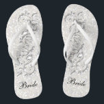 White Confetti Glitzer & White Metallic | Braut Badesandalen<br><div class="desc">Brautparty Drehte Flop Shoes bereit für Sie zu personalisieren. Wenn nötig... Sie können mit dem Zazzle-Design-Tool-Bereich mit Ihren eigenen Texten, Textfarben und Schriftart neu starten. ✔ Hinweis: Nicht alle Vorlagenbereiche müssen geändert werden. 📌 Wenn Sie weitere Anpassungen benötigen, klicken Sie bitte auf den Button "Weitere Anpassungen vornehmen" oder "Design anpassen...</div>