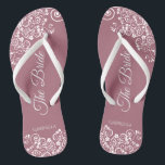 White Lace on Dusty Rose Elegant Bride's Wedding Badesandalen<br><div class="desc">Tanzen Sie die Nacht mit diesen schönen Hochzeitsflip-Flops. Sie sind für die Braut konzipiert und zeichnen sich durch ein schlichtes und dennoch elegantes Design aus. extravagante Schriftzeichen auf einer staubigen Rose oder violett rosa Hintergrund und weiße Spitzen-Gürtel und Wirbel. Eine schöne Art, extravagant und angemessen bleibe, während Sie Ihren Füßen...</div>