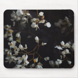 White moody flowers on dark background mousepad