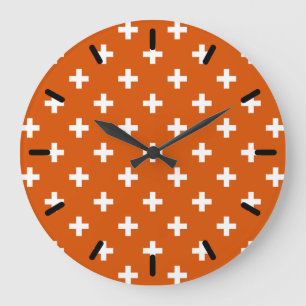 White polka crosses on burnt orange große wanduhr