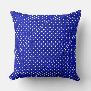 white polka dots on blue kissen