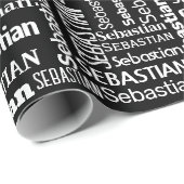 White SEBASTIAN Name on Black Geschenkpapier (Rolleneckpunkt)