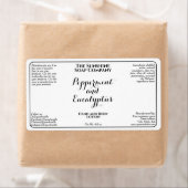 White w curly text cosmetics bottle label (Insitu)