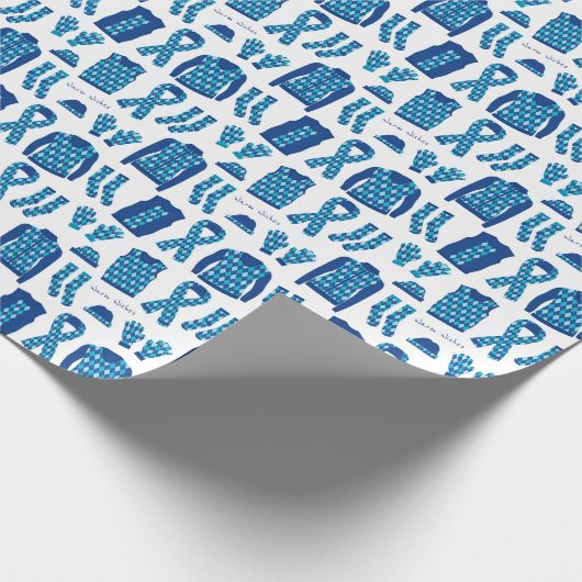 Whitepaper zum Umpacken von Elementen mit blauer R Geschenkpapier (Ecke)